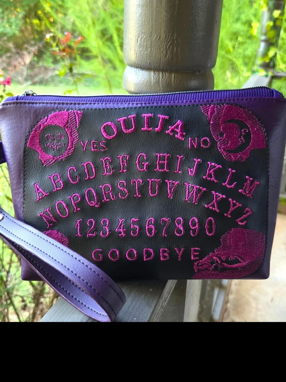 Asylum Handicrafts compact wristlet